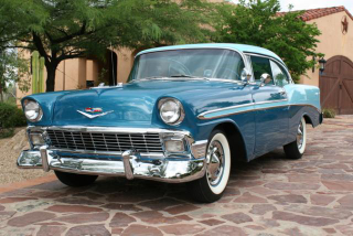 This is the color combination he had on his, plus fender skirts partially covering the back wheels. His car was a rare breed powertrain-wise, packing the most potent engine available that year. It had the 265 cubic inch Super Turbo-Fire V8 from that year’s Corvette, backed by a column-mounted three-speed synchromesh manual transmission, coloquially known as the “three-on-the-tree.”